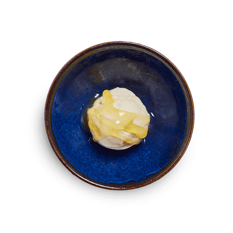 vanilla pod ice cream with passion fruit sauce
